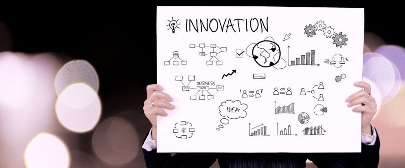 A person holding a card. The heading reads 'Innovation' and there are graphs and images representing partnership and innovation